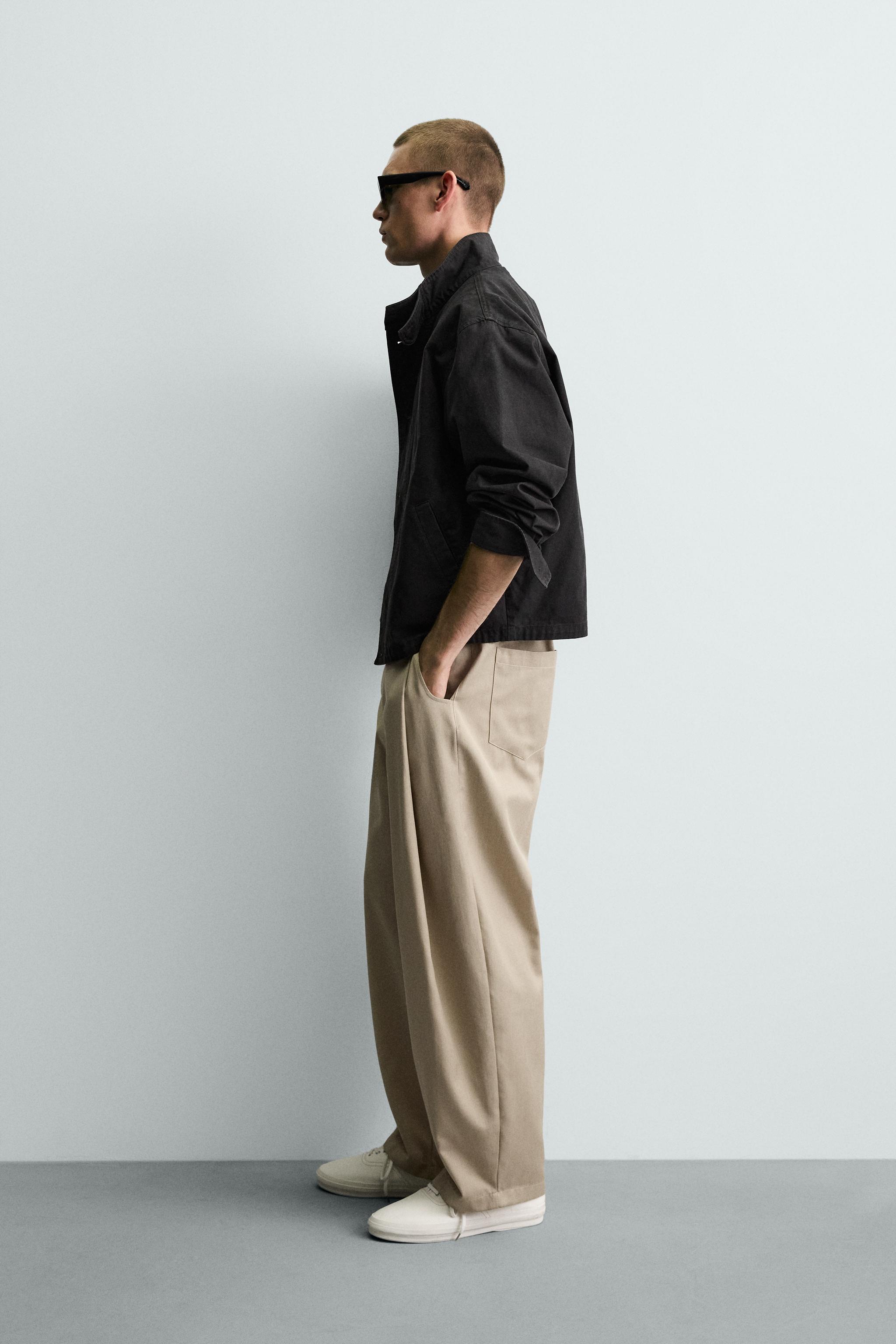 PLEATED BALLOON FIT PANTS